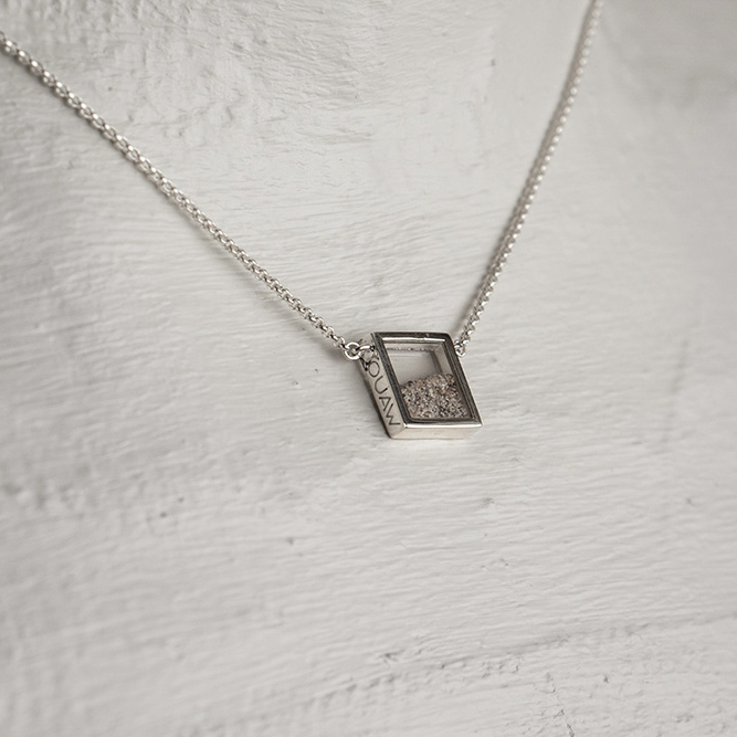 Kindred small 3 Close op of Square sand locket necklace on doll