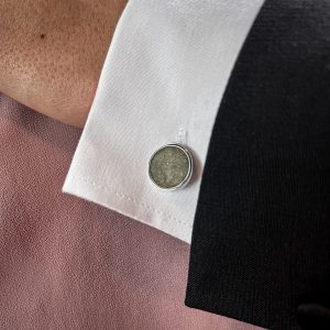 Round concrete steel cuff on man close up